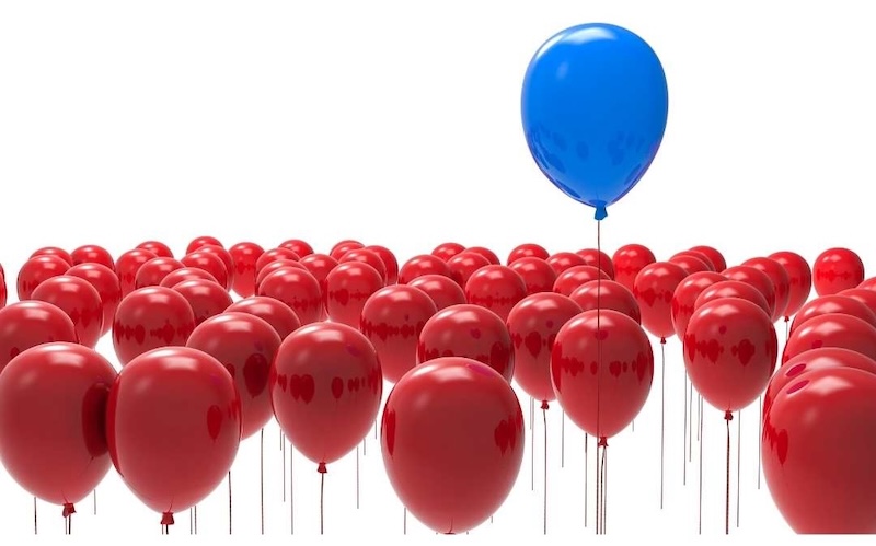 un globus que sobresurt als altrs